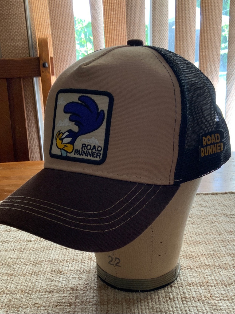 Road Runner Embroidered Trucker Hat in Cream and Brown